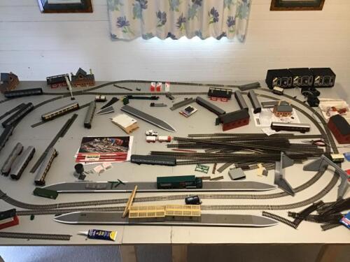 TRAIN SET: A Hornby&nbsp;assorted trains set with track side buildings, as pictured