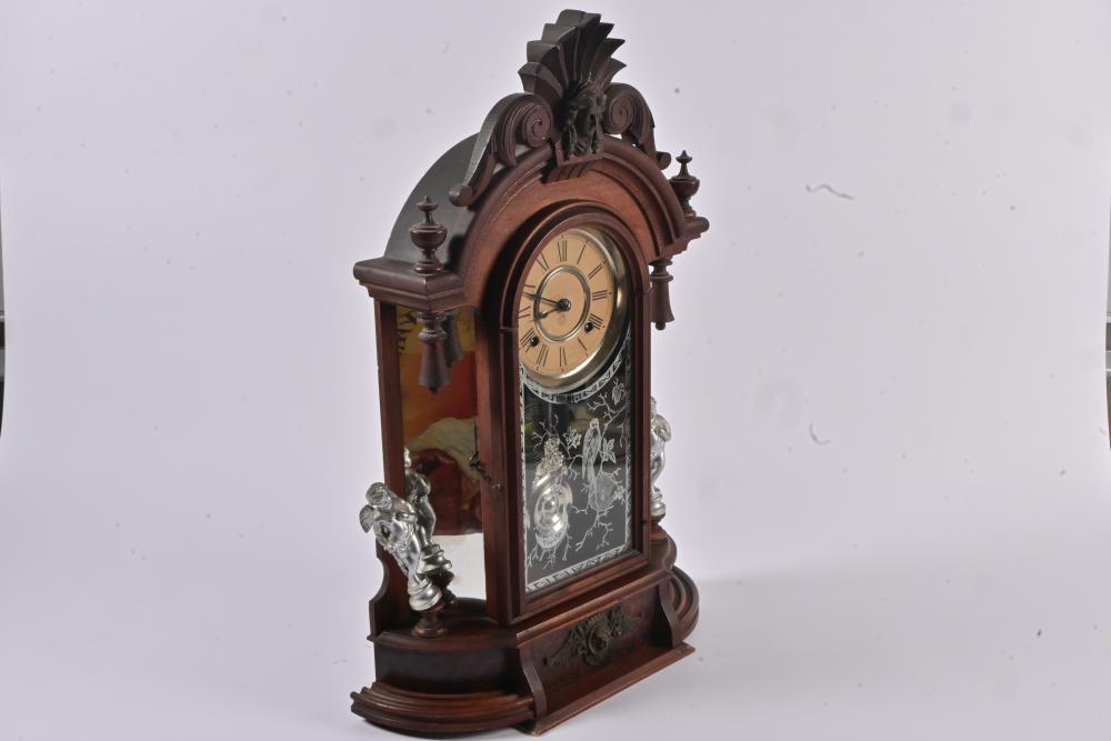 EIGHT DAY CLOCK: An early 20th century walnut eight day Triumph mantel ...