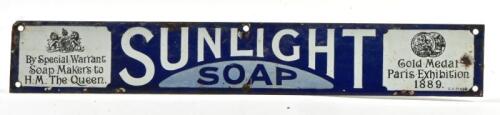 SUNLIGHT: An Antique Sunlight soap enamel sign, marked lower right: C.E.Co 1/98, 7 x 46.5cm