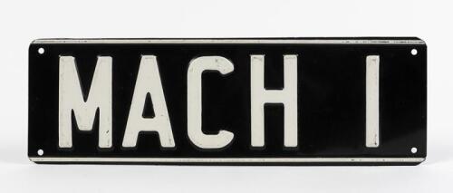 NUMBER PLATE: A metal&nbsp;number plate "MACH 1", 11.5 x 36.5cm