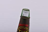 CASTROL: An early Castrol Wakefield oil bottle rack with six embossed bottles including three quart and three pint glass bottles - 15