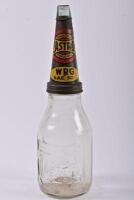 CASTROL: An early Castrol Wakefield oil bottle rack with six embossed bottles including three quart and three pint glass bottles - 16