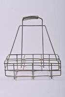 CASTROL: An early Castrol Wakefield oil bottle rack with six embossed bottles including three quart and three pint glass bottles - 29