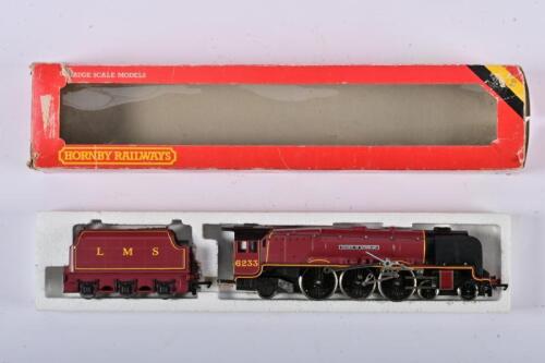 HORNBY: A Hornby&nbsp;00 Gauge LNER&nbsp;'Duchess of Sutherland' &nbsp;4-6-2&nbsp;locomotive and tender, boxed, parts loose/lacking&nbsp;to wheels, as pictured.