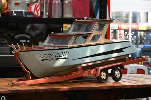 MODEL YACHT: A large and impressive scratch built battery powered model of a yacht, with trailer,150cm long including trailer