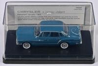 CHRYSLER: A 1:43 scale Trax Chrysler R series Valiant in 1962, deep blue, TR35F, in perspex case