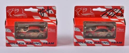 HOLDEN: Two 1:64 scale Classic Carlectables Holden Commodore as race by Bright/Skaife in HRT Racing Commodore, signed by Bright/Skaife in fitted box