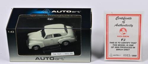 COMMODORE: A 1:43 scale Autoart Holden Commodore FJ, cream, with COA numbered 915/3000, in perspex case