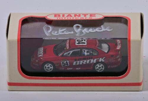 PETER BROCK: A 1:64 scale Biante Commodore VX 2002 as race by Baird, Team Brock, in fitted box signed by Brock