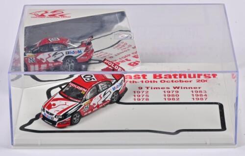 COMMODORE: A 1:64 scale Biante Holden HRT VY Commodore as race by P.Brock/ J.Plato at the 2004 Bathurst 1000 race, #05, in perspex case