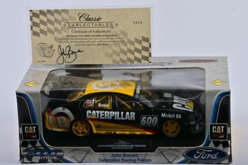 JOHN BOWE: A limited edition 1:18 scale Classic Carlectables Ford Falcon as raced by Bowe in 2000 Caterpillar Racing Falcon, roof signed by Bowe, with COA signed by Bowe numbered 2433/6000, in fitted box