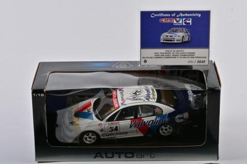 COMMODORE: A limited edition 1:18 scale Autoart Holden Racing Car as race by G/Tender in 2000 Valvoline Cummins, #34, with COA numbered 2753/2820, roof signed by Tender, in fitted window box.