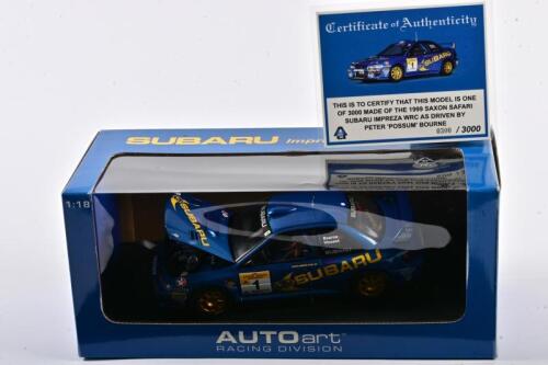 SUBARU: A limited edition 1:18 scale Autoart Subaru Impreza WRC as raced by Peter 'Possum' Bourne in the 1999 Saxon Safari Subaru, with COA numbered 300/3000, in fitted window box