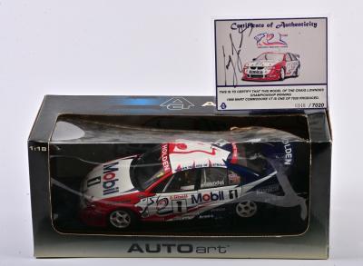 COMMODORE: A limited edition 1:18 scale Autoart Series Championship MHRT Commodore VT in 1999 raced by Craig Lowndes, with COA signed by Lowndes numbered 6148/7020, in fitted window box