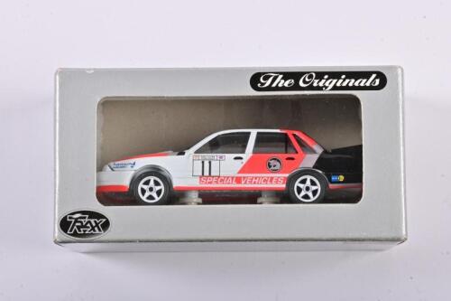 LARRY PERKINS: A 1:43 scale Trax Holden Commodore Group A VL as race by Perkins, #11, TR16E, hand signed in fitted box by Perkins