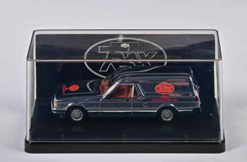 FALCON: A 1:43 scale Trax Ford Falcon XF Panel Van released 1984, silver, TR76, in perspex case