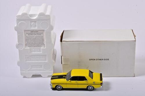 FALCON: A 1:24 scale Trax XY Falcon GTHO Phase III, yellow with black stripes, in fitted box