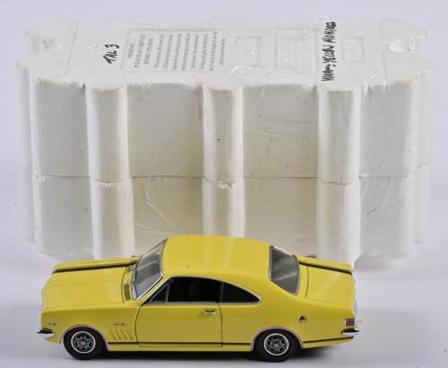 MONARO: A 1:24 scale Trax Holden Monaro GTS, yellow with black stripes, missing rear view mirror, in fitted box