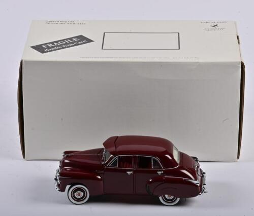 HOLDEN: A 1:24 scale Trax Holden FJ Special Sedan 1953, red, steering link glued, in fitted box