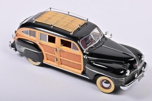 CHRYSLER: A 1:24 scale Danbury Mint 1942 Chrysler Town & Country, Wood-Bodied Station Wagon is finished in Black and features genuine wood panels and trim, no box