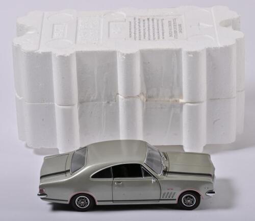 MONARO: A 1:24 scale Trax HG Monaro GTS 350, silver with black stripes, in fitted box