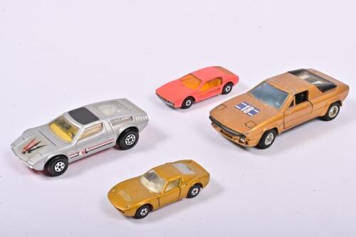 MASERATI/LAMBORGHINI: A 1:43 scale Maserati Bora by Matchbox and three Lamborghinis scale 1:39 the biggest one by Matchbox/Silhouette, no box