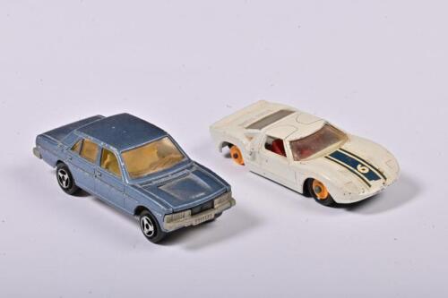 FORD/PEUGEOT: Two 1:60 scale Ford GT by Matchbox, white missing one tyre and Peugeot 604 by Majorette, metallic light blue, no box