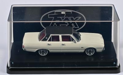 CHRYSLER: A 1:43 scale Trax Chrysler VG Valiant Regal in 1970, alpine white with black vinyl roof, TR92, in perspex case