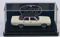 CHRYSLER: A 1:43 scale Trax Chrysler VG Valiant Regal in 1970, alpine white with black vinyl roof, TR92, in perspex case