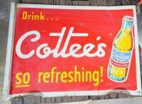 A double-sided tin &lsquo;Cottees&rsquo; tin sign with vertical rolled edges