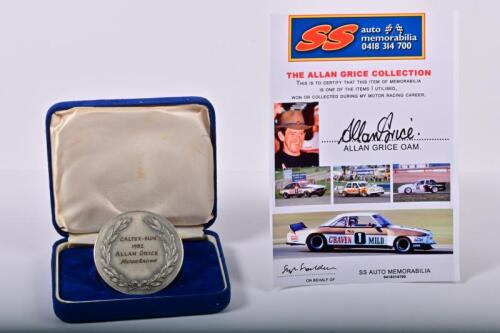 GRICE: A 1982 CALTEX SPORTS STAR OF THE YEAR QUALIFYING AWARD medallion as awarded to Allan Grice - 'CALTEX-SUN 1982 ALLAN GRICE Motoring Racing'. Allan Grice signed CoA
