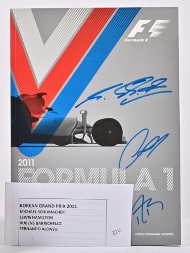 FORMULA 1: A 2011 Autographed Race Programme&nbsp;from the Korean GP autographed on the cover by drivers including Fernando Alonso, Lewis Hamilton, and 2 others.