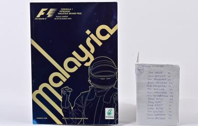 FORMULA 1: A 2014 Malaysia Kuala Lumpur GP race programme autographed by drivers and team staff, including Toto Wolf, Valtteri Bottas, Adrian Sutil and 12 others.