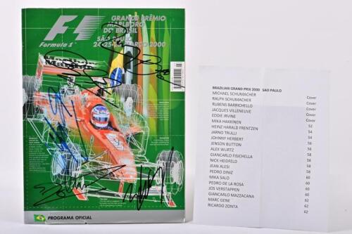 FORMULA 1: A autographed race programme from the 2000 Brazilian GP Sao Paulo race. Autographed by drivers including, Michael Schumacher, Rubens Barrichello, Jos Verstappen and 18 others.