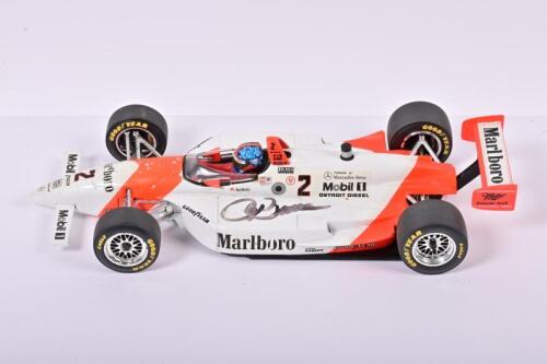 PENSKE: A 1:18 scale Minichamps 'INDYCAR COLLECTION' Indy Car in Marlboro livery. Model signed by Roger Penske