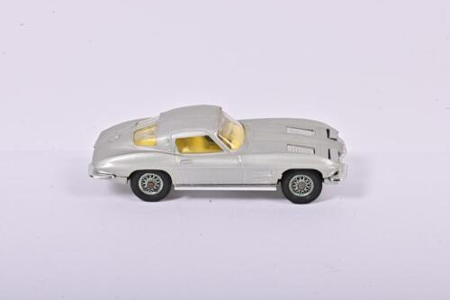 CORVETTE: A superb CORGI TOYS CHEVROLET CORVETTE STINGRAY (310). Silver, lemon interior
