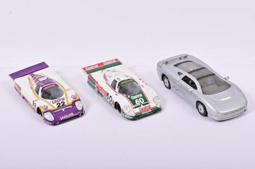 JAGUAR: Three 1:43 scale Jaguar models. Two ONYX Jaguar XJR9 in 'Castrol' liveries
