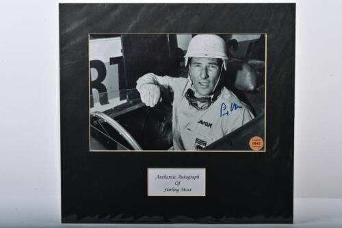 MOSS: A black and white picture of Stirling Moss Picture signed by Stirling Moss. CoA
