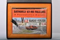 FORD: A boxed version of Stephen Stathis book - 'BATHURST GT-HO FALCONS - A PHOTOGRAPHIC HISTORY' - hardcover. Numbered 62. Book signed by numerous Bathurst drivers including Bill Brown, Leo Geoghegan, Bob Morris, John Goss, Bob Skelton, Damon Beck - 2