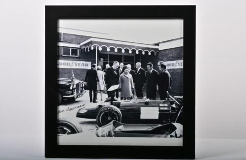 McLAREN / HULME: A black and white picture of H.R.H Princess Margaret visiting the Goodyear Tyre plant in 1969 with McLaren & Hulme present with their cars, team owner Ron Tauranac signature