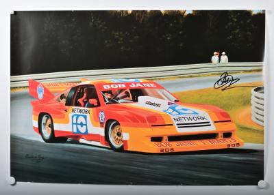 JANE: A Martin de Lang print depicting Bob Jane racing a Chevy Monza. Bob Jane signature