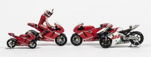 STONER: Four Casey Stoner model motor bikes of various scales and makes. Casey Stoner rider figurine