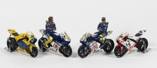 ROSSI/YAMAHA: Four Valentino Rossi/Yamaha 1:12 scale Minichamps motor cycle models including four Yamaha YZR-M1 models with 'FIAT' and 'ABARTH' liveries. Two models with 1:12 scale Minichamp Valentino Rossi figurines