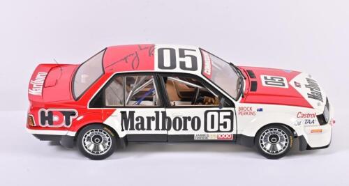 COMMODORE: A limited edition 1:18 scale Classic Carlectables Holden VH Commodore as race by Brock/Perkins in 1982 Bathurst, #05, with a colored copy of COA numbered 378/4500, disattached roof aerial, roof of the car signed by Perkins, in styrofoam box