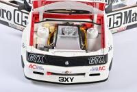 COMMODORE: A limited edition 1:18 scale Classic Carlectables Holden VH Commodore as race by Brock/Perkins in 1982 Bathurst, #05, with a colored copy of COA numbered 378/4500, disattached roof aerial, roof of the car signed by Perkins, in styrofoam box - 7