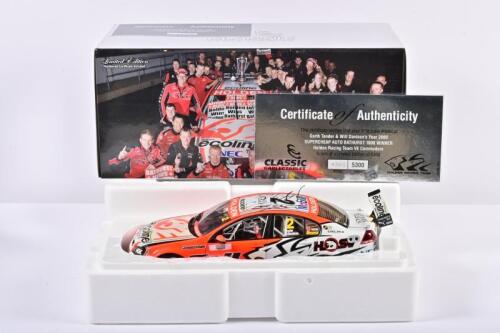 COMMODORE: A limited edition 1:18 scale Classic Carlectables Holden VE Commodore as race by Garth Tanders/ Will Davisons in 2009, with COA numbered 4361/5300, roof signed by both drivers, replica trophy included inside, in double fitted box