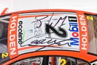 COMMODORE: A limited edition 1:18 scale Classic Carlectables Holden VE Commodore as race by Garth Tanders/ Will Davisons in 2009, with COA numbered 4361/5300, roof signed by both drivers, replica trophy included inside, in double fitted box - 3