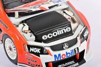 COMMODORE: A limited edition 1:18 scale Classic Carlectables Holden VE Commodore as race by Garth Tanders/ Will Davisons in 2009, with COA numbered 4361/5300, roof signed by both drivers, replica trophy included inside, in double fitted box - 7