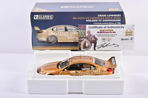 COMMODORE: A limited edition 1:18 scale Classic Carlectables Holden VF Commodore as race by Lowndes in 100 ATCC/V8 Supercar race wins, with colored copy of COA signed by Lowndes numbered 761/1888, in fitted box