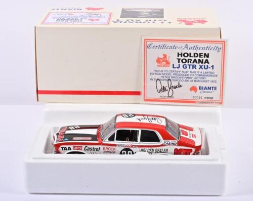 TORANA: A 1:18 scale Biante Holden LJ Torana GTR XU-1 as race by Brock in 1972 Hardie Ferodo 500, #28C, with signed COA by Brock numbered 3544/12000, roof signed by Brock, right wing mirror and windshield broken fixed with glue, in fitted box, box faded (
